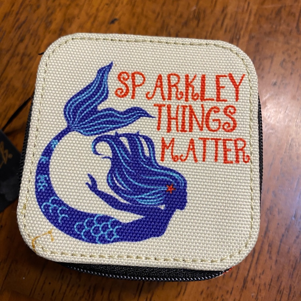 Mona B “Sparkly things matter” jewelry square .  New with tags.